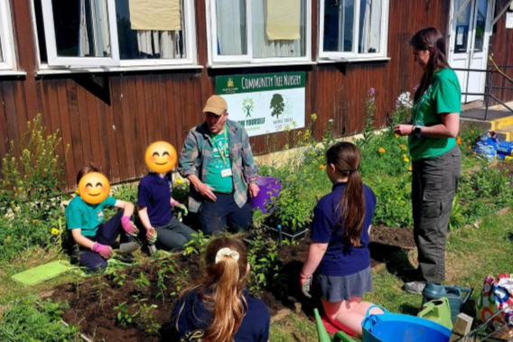 School children planting trees